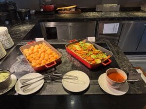 Chorizo potato croquettes and chicken satay skewers.